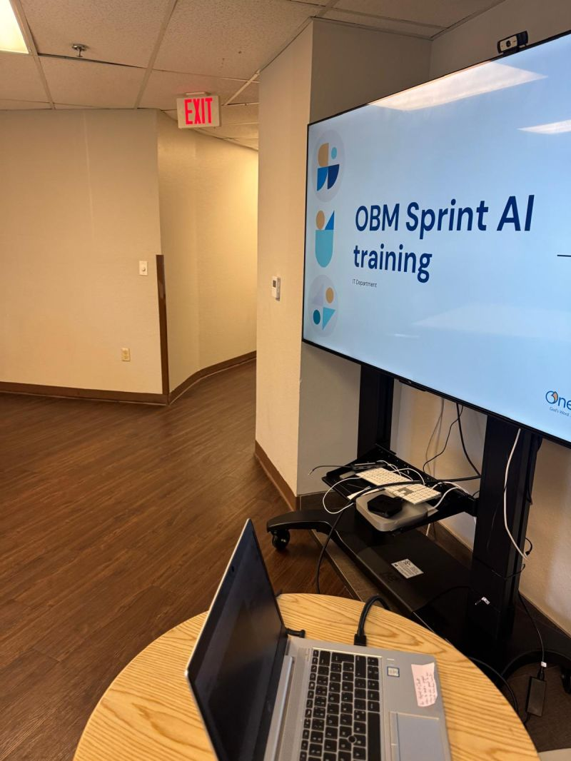 AI training session slide titled OBM Sprint AI training, presented by the IT Department at OneHope